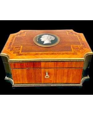 Inlaid wood box with geometric motifs.