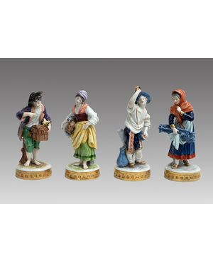 Group of four antique polychrome Capodimonte porcelain sculptures depicting the four seasons. Naples, 19th century.