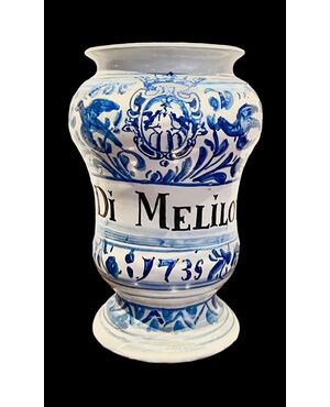 Maiolica albarello vase with plant motifs, birds, and snakes decoration. Ferniani, Faenza.