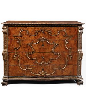 Walnut burl veneered chest of drawers, carved pilasters and gilded "a mecca" frames, rosette with inlaid scene in various woods on the top, Lombardy, 18th century