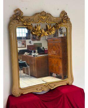 Lacquered and gilded mirror. Siena early 1800s