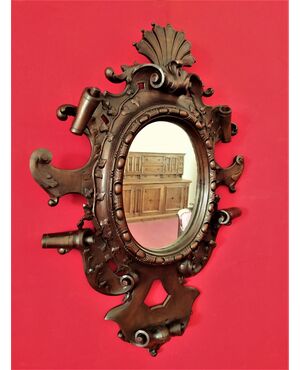 Mirror in carved wood