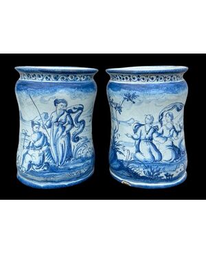 Pair of majolica albarello vases decorated with figures in a rural setting. Lantern signature. Savona.