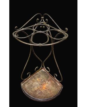 Wrought iron umbrella-cane stand.