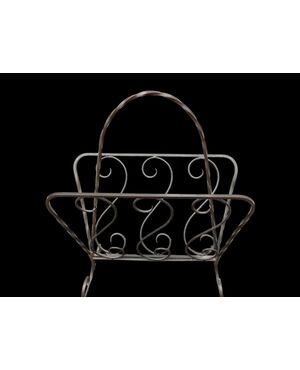 Wrought iron magazine rack.