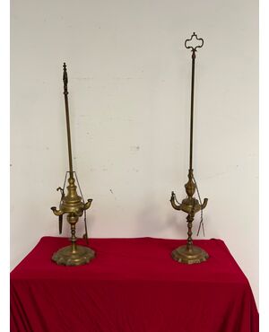 Pair of Florentine bronze oil lamps, early 18th century