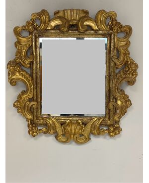 Specchiera emiliana in legno intagliato e dorato Barocco XVII secolo