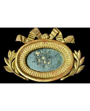 Small gilded wooden oval mirror with bow - Italy, late 18th / early 19th century