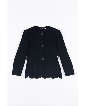 “Anni Folli” giacca nera profili merlati