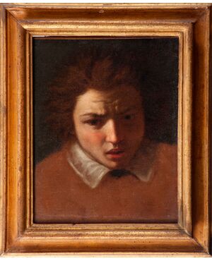 Caravaggesco Painter, 17th Century, Portrait of a Child, oil on canvas with gilt wood frame     