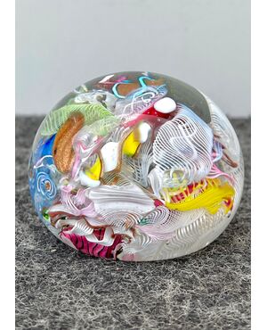 Press-papier paperweight in submerged glass with murrine, retortoli, spirals and silver leaf inclusions.     