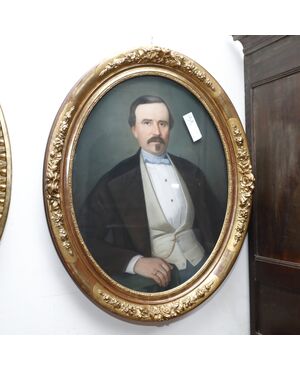 Pair of characters with gilded wooden frame with carved flowers     