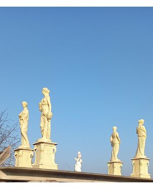 Statue quattro stagioni in ghisa con piedistallo