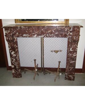 Antique fireplace in red marble from France.     