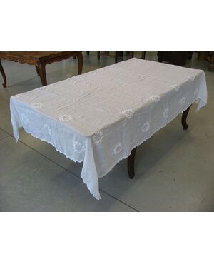Antique white cotton tablecloth with crochet inlays.