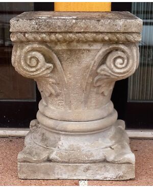 Capital in carved stone