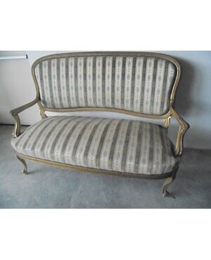 Sofa in gilded wood