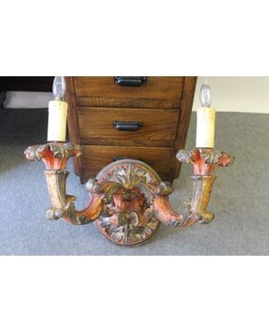 : Antique lacquered applique with two arms from the Baroque period 1650 ca.