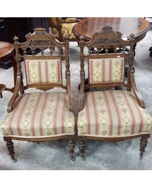 Pair of mahogany armchairs with English Victorian sculpture works