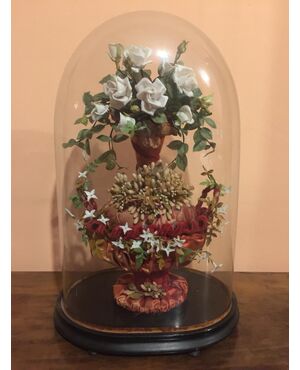 Bouquet of wedding flowers under a glass bell from the Napoleon III era