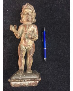 Wooden sculpture of the Infant Jesus with traces of the original lacquering, dating back to the 18th century.