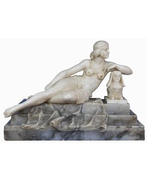 Sculpture of a female figure resting on a sphinx, Alabaster, work of the twentieth century     