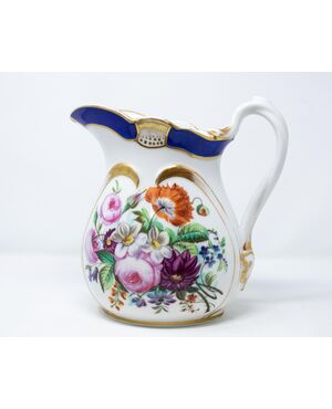 Late 19th century. Jug with floral decoration     