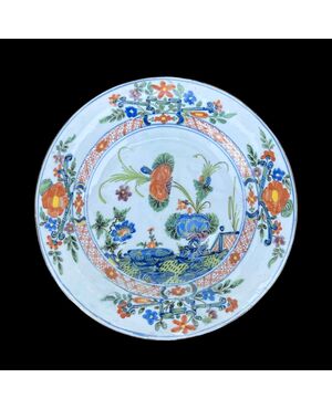 Majolica plate with carnation decoration.Ferniani manufacture, Faenza.     