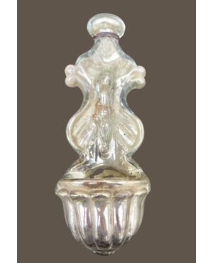 Holy water stoup in blown glass with internal silver plating and figure of Christ in relief.Murano.     