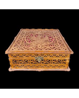 Openwork softwood box with stylized neoclassical, vegetal and geometric characters motif Italy.     