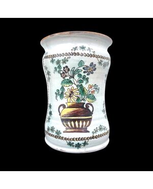 Albarello in maiolica decorato con vaso di fiori e motivi vegetali.Manifattura di Cerreto Sannita.Data 1791.