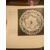 Piatto in maiolica con tesa lobata e traforata.Decoro a motivi geometrici stilizzati e stemma nobiliare al centro.Manifattura di Angelo del Vecchio .Napoli(op.1753-1764).