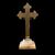 Piccolo Cristo in croce in bronzo e smalto con base in alabastro.