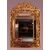Ricca grande specchiera intagliata a traforo in legno dorato foglia oro francese del 1800