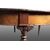 Grande tavolo circolare allungabile inglese del 1800 in mogano e piuma di mogano 2 metri / 5 metri