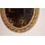 Grande specchiera ovale verticale francese del 1800 riccamente rifinita con stupenda cimasa