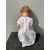 Bambola con testa in bisquit, occhi mobili e corpo in cartapesta.Firma Heuback,Germania.