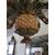 Grande e particolare lampadario in legno intagliato e laccato