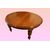 Antico grande tavolo circolare allungabile del 1800 inglese in legno di mogano presenta allunghe già restaurato