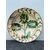 Piatto in ceramica ingobbiato a decoro ‘popolaresco’ con elementi vegetali stilizzati.'Verso' parzialmente invetriato.Calabria.