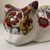 FORNASETTI, White flowered crouching cat, hand painted ceramic sculpture     