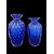Serie di tre vasetti in vetro pesante blu a corpo costolato e bocca espansa con inclusione di bolle e foglia oro.Manifattura Barovier.Murano.