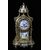Tris composto da orologio e due candelabri francesi del 1800 meccati con quadrante in porcellana di Sevres