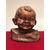 head of a child in terracotta. Signed     