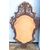 Specchiera in legno intagliato,traforato  e dorato con motivi vegetali stilizzati e rocaille.Periodo Luigi  XV