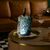 Esplorando l'Eleganza: Il Raffinato Vaso Veneziano in Vetro Satinato con Volto di Uomo verde smeraldo