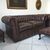 Poltrona, divano e poggiapiedi chesterfield inglesi originali nuovi 