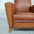 Coppia di poltrone club francese in cuoio cognac degli anni '50