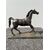 Scultura in bronzo con base raffigurante cavallo.