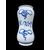 Albarello in maiolica decorato con personaggio maschile su sfondo rupestre in monocromia turchina.Napoli.